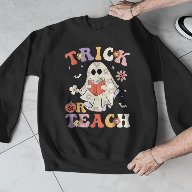 Groovy Halloween Trick Or Teach Retro Floral Ghost Teacher Men Graphic Sweatshirt, Groovy Teacher Gifts, funny design Groovy Halloween Trick Or Teach Retro Floral Ghost Teacher Men Graphic Sweatshirt, Groovy Teacher Gifts, funny design