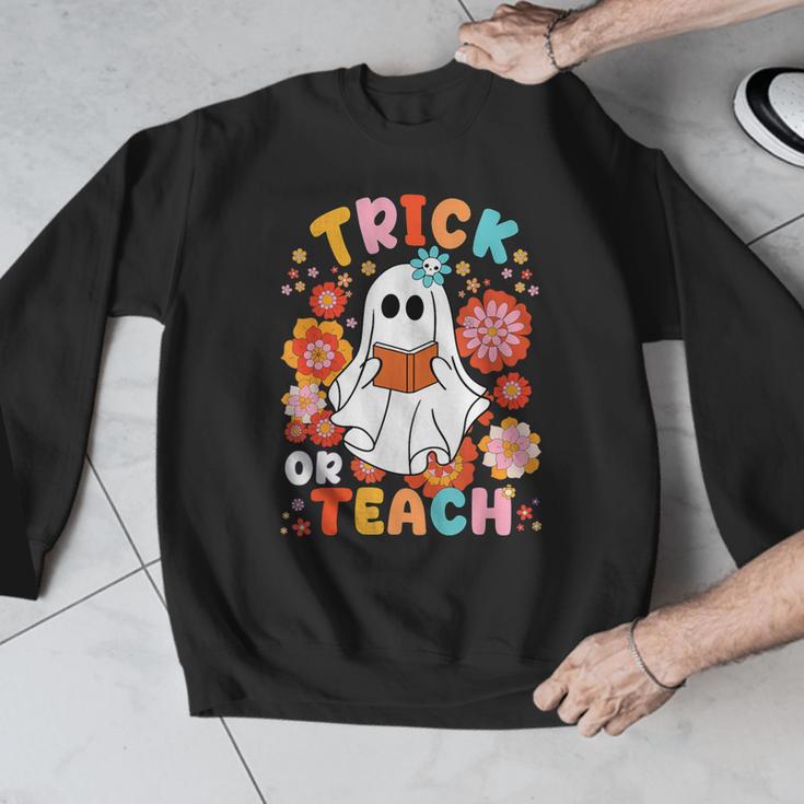 Groovy Halloween Trick Or Teach Retro Floral Ghost Teacher For Men Women Kids Men Graphic Sweatshirt, Groovy Teacher Gifts, funny design
