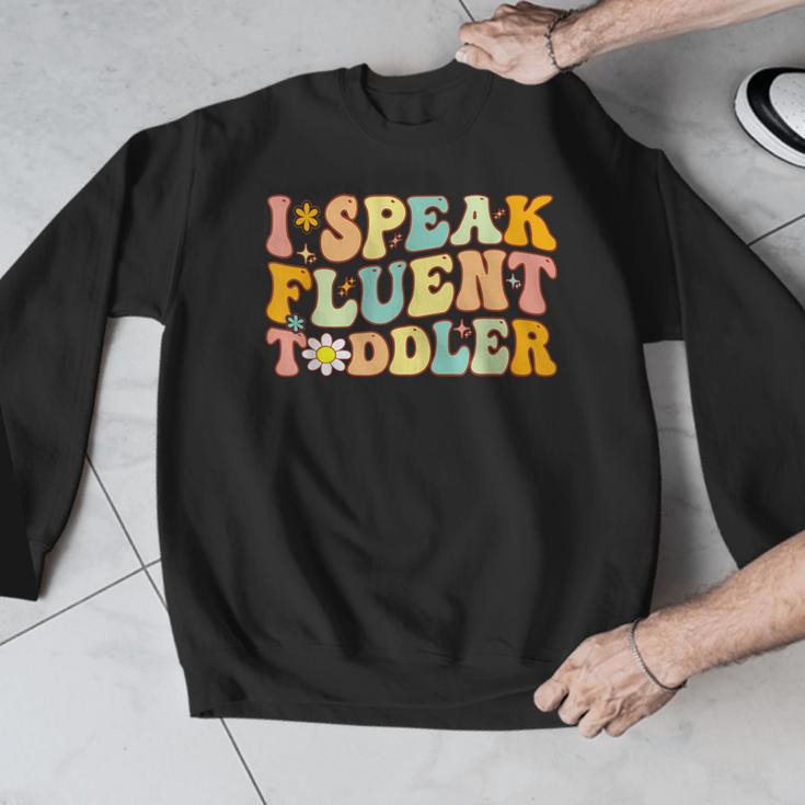 Groovy I Speak Fluent Toddler Daycare Provider Teacher Men Graphic Sweatshirt, Groovy Teacher Gifts, funny design Groovy I Speak Fluent Toddler Daycare Provider Teacher Men Graphic Sweatshirt, Groovy Teacher Gifts, funny design