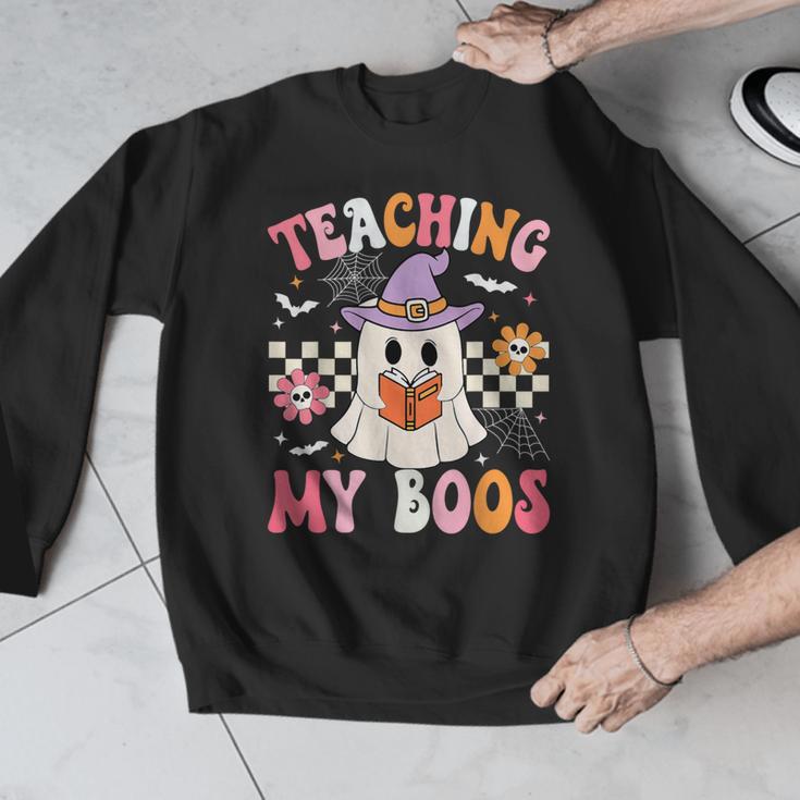 Groovy Teaching My Boos Teacher Ghost Halloween Teacher Men Graphic Sweatshirt, Groovy Teacher Gifts, funny design Groovy Teaching My Boos Teacher Ghost Halloween Teacher Men Graphic Sweatshirt, Groovy Teacher Gifts, funny design