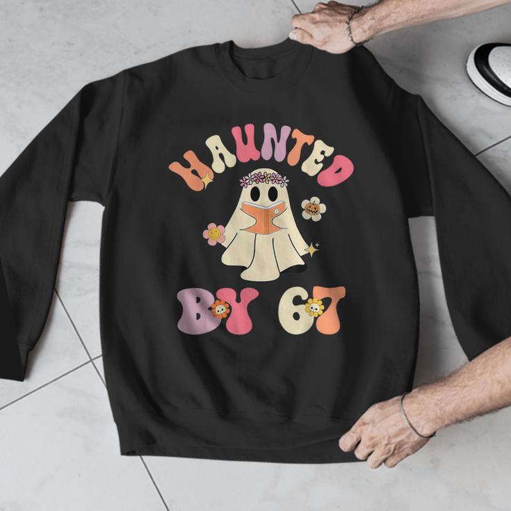 Haunted By 67 Meme Six Seven 6 7 Halloween Teachers Men Graphic Sweatshirt, funny design Haunted By 67 Meme Six Seven 6 7 Halloween Teachers Men Graphic Sweatshirt, funny design