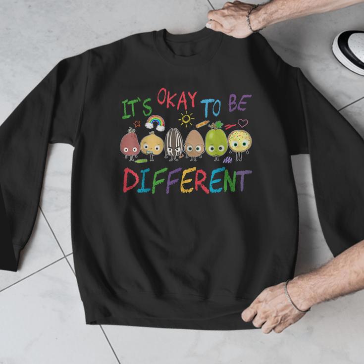 It's Ok To Be Different Apple Teacher Autism Awareness Men Graphic Sweatshirt, funny design It's Ok To Be Different Apple Teacher Autism Awareness Men Graphic Sweatshirt, funny design