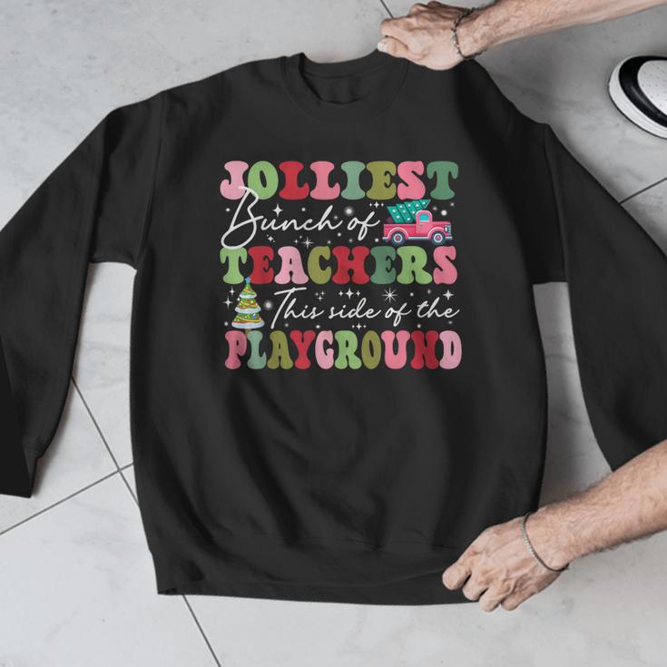 Jolliest Bunch Of Teachers This Side Of The Playground X-Mas Men Graphic Sweatshirt, funny design Jolliest Bunch Of Teachers This Side Of The Playground X-Mas Men Graphic Sweatshirt, funny design
