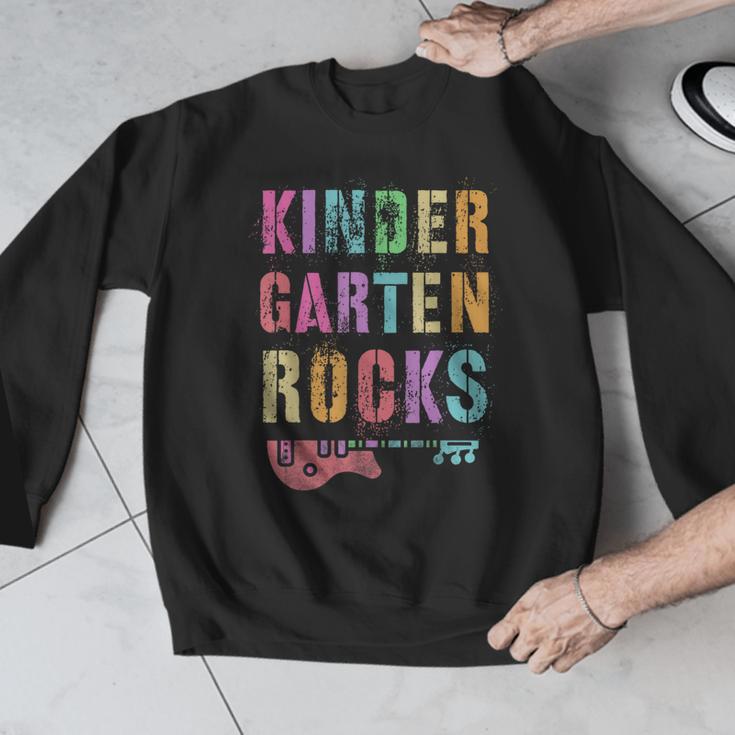 KINDERGARTEN ROCKS Teacher Crew Rock Star Kinder Team Men Graphic Sweatshirt, funny design KINDERGARTEN ROCKS Teacher Crew Rock Star Kinder Team Men Graphic Sweatshirt, funny design