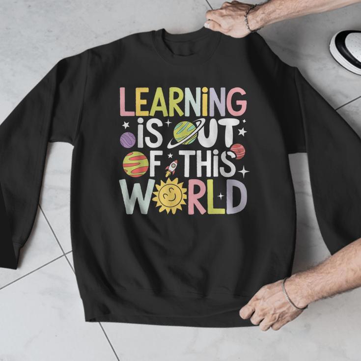 Learning Is Out Of This World Space Teacher Cute Groovy Men Graphic Sweatshirt, Groovy Teacher Gifts, funny design