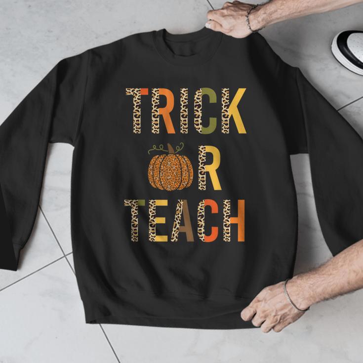 Leopard Trick Or Teach Halloween Teacher Costume Women Men Graphic Sweatshirt, funny design Leopard Trick Or Teach Halloween Teacher Costume Women Men Graphic Sweatshirt, funny design