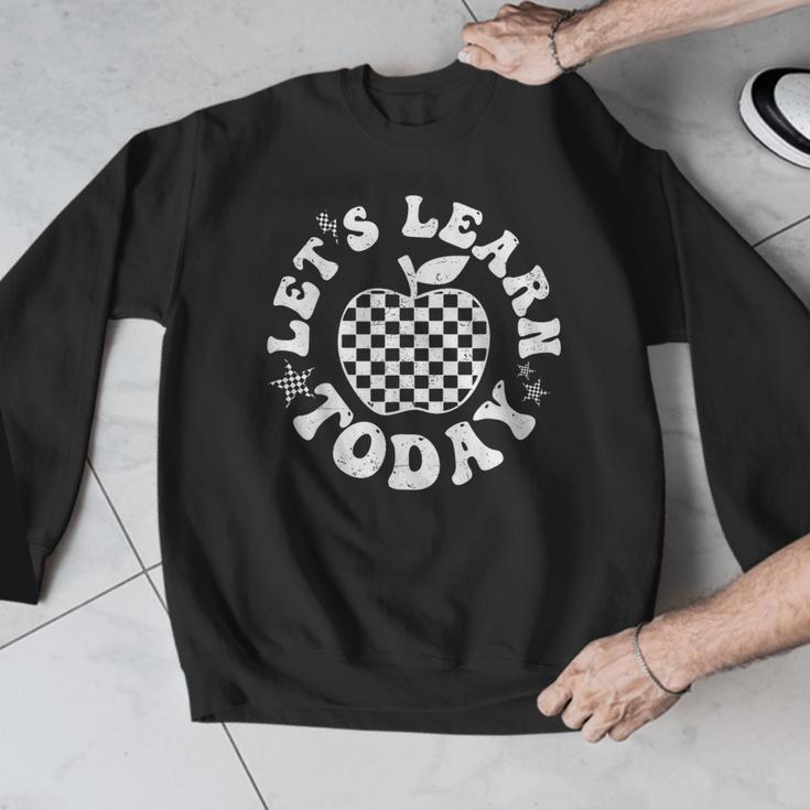 Let's Learn Today Checkered Apple Back To School Teacher Men Graphic Sweatshirt, funny design Let's Learn Today Checkered Apple Back To School Teacher Men Graphic Sweatshirt, funny design