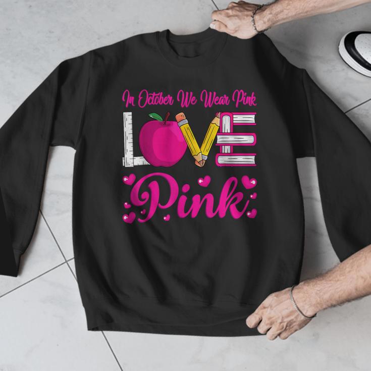 In October We Wear Pink Love Teacher Breast Cancer Awareness Men Graphic Sweatshirt, funny design In October We Wear Pink Love Teacher Breast Cancer Awareness Men Graphic Sweatshirt, funny design