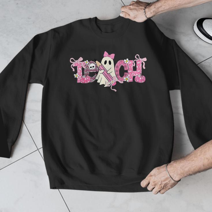 Pink Ghost Teach Halloween Teacher In Spooky Season Men Graphic Sweatshirt, funny design Pink Ghost Teach Halloween Teacher In Spooky Season Men Graphic Sweatshirt, funny design
