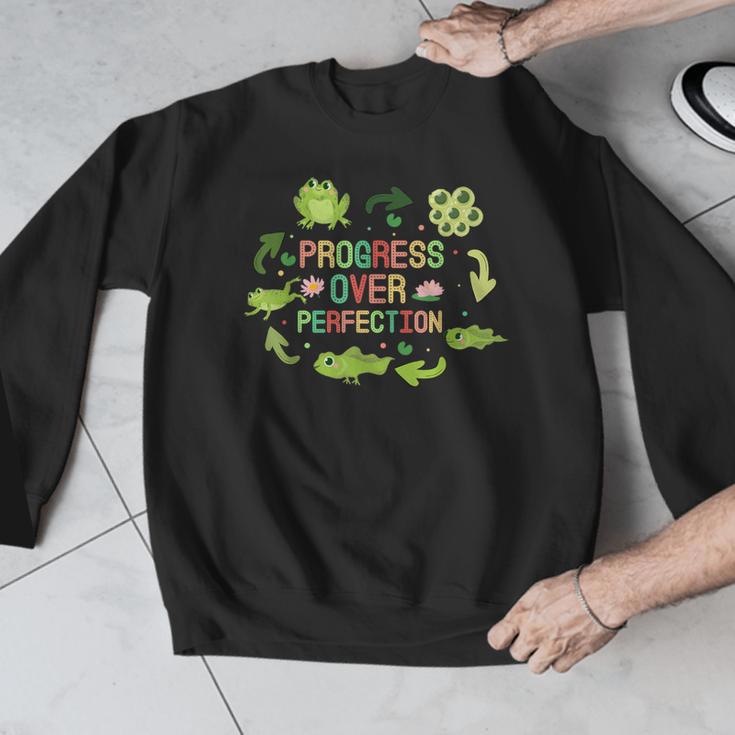 Progress Over Perfection Frog Back To School Teacher Men Graphic Sweatshirt, funny design