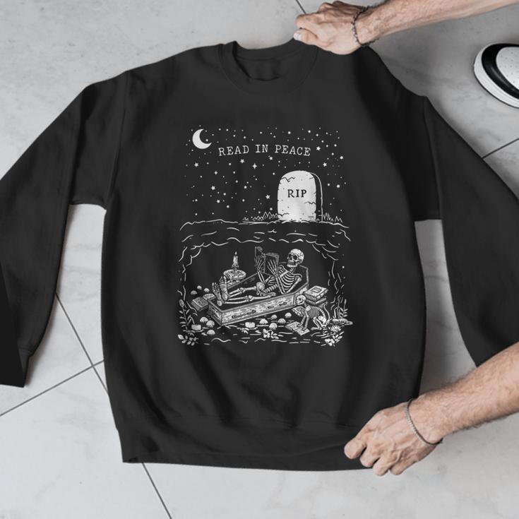 Read In Peace Skeleton Halloween Book Reading Spooky Teacher Men Graphic Sweatshirt, funny design Read In Peace Skeleton Halloween Book Reading Spooky Teacher Men Graphic Sweatshirt, funny design