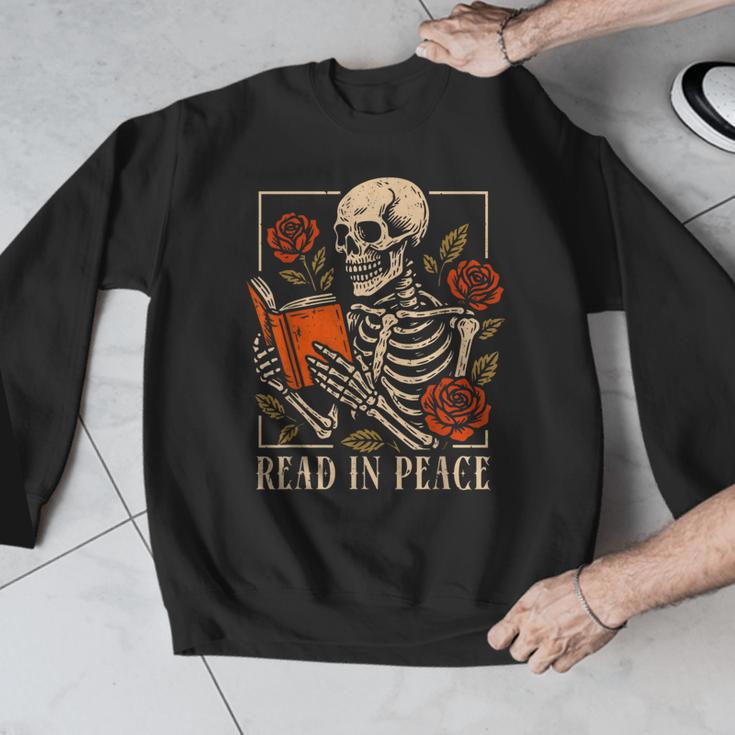 Read In Peace Skeleton Reading Book Halloween Teacher Men Graphic Sweatshirt, funny design