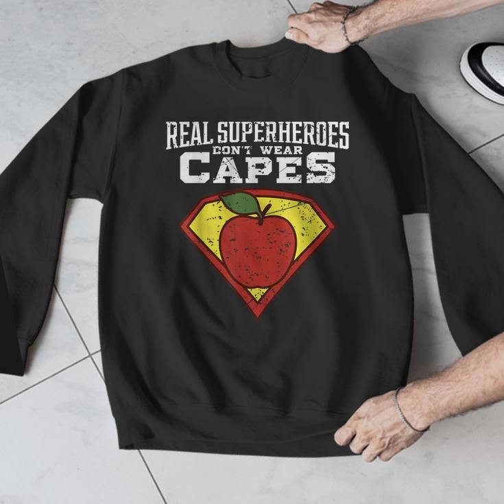 Real Superheroes Don't Wear Capes Teacher Shirt Teaching Te Men Graphic Sweatshirt, funny design