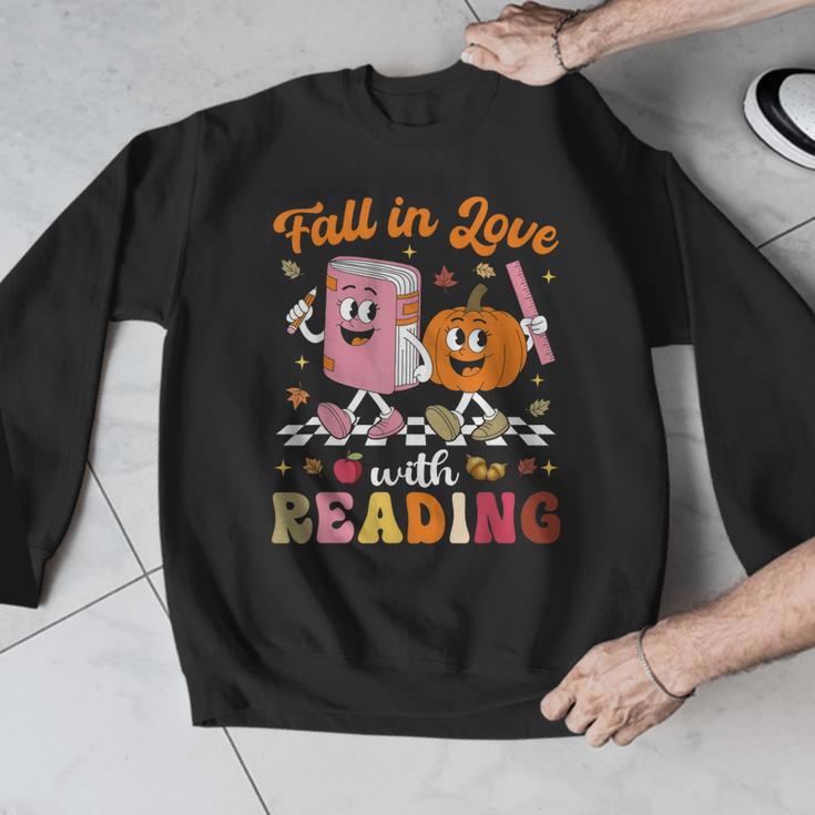 Retro Fall In Love With Learning Pumpkin Autumn Teacher Men Graphic Sweatshirt, funny design