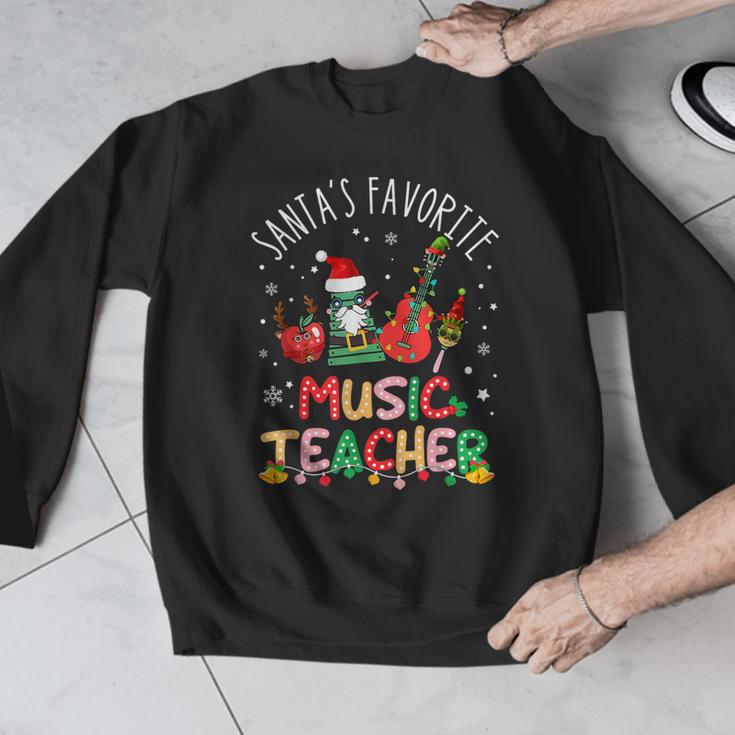 Santa's Favorite Music Teacher Christmas Santa Hat Matching Men Graphic Sweatshirt, funny design Santa's Favorite Music Teacher Christmas Santa Hat Matching Men Graphic Sweatshirt, funny design