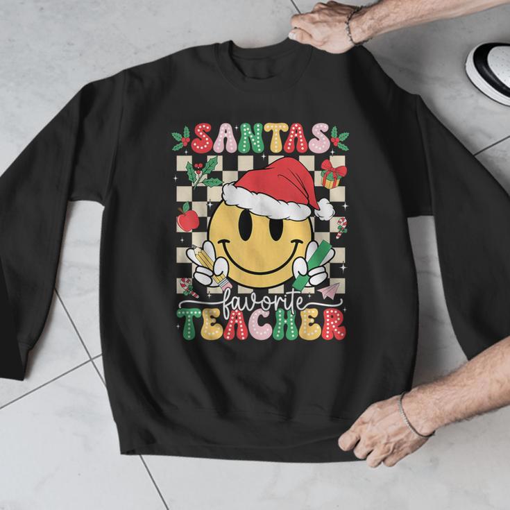 Santas Favorite Teacher Retro Groovy Smile Face Christmas Men Graphic Sweatshirt, Groovy Teacher Gifts, funny design