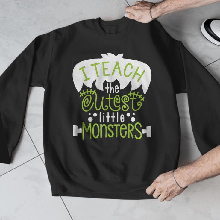 I Teach The Cutest Little Monsters Halloween Teacher Spooky Men Graphic Sweatshirt, funny design