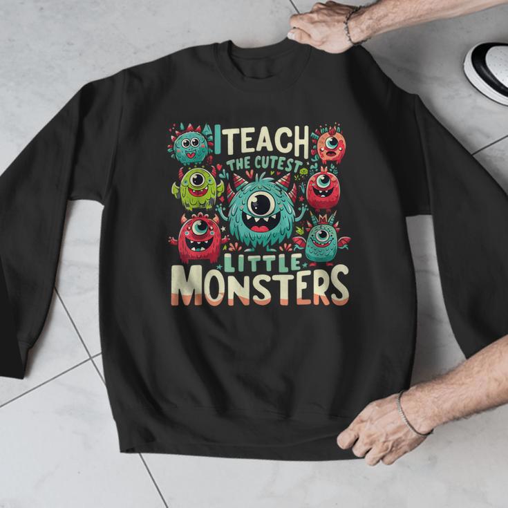 I Teach The Cutest Little Monsters Teacher Halloween Outfit Men Graphic Sweatshirt, funny design
