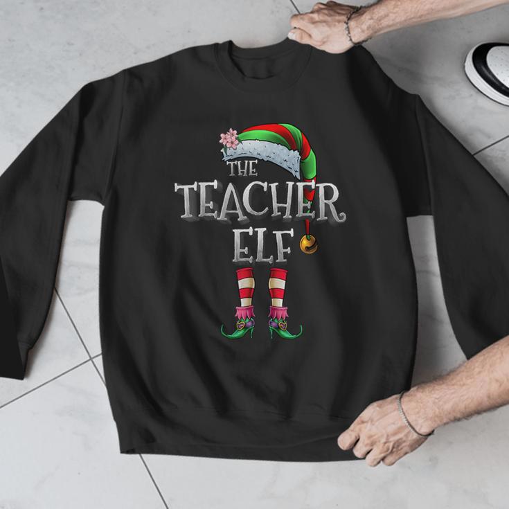 The Teacher Elf Shirt Matching Family Christmas Elf Men Women Kids Men Graphic Sweatshirt, funny design