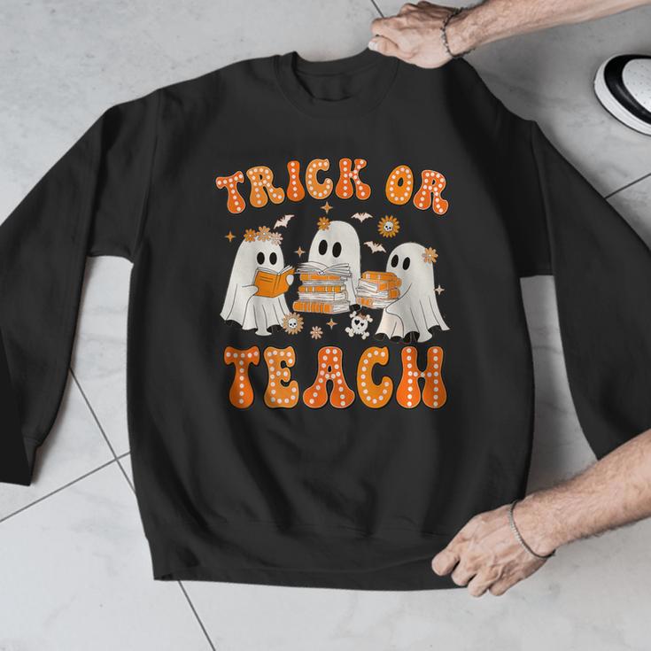 Teacher Halloween Trick Or Teach Retro Groovy Floral Ghost Men Graphic Sweatshirt, Groovy Teacher Gifts, funny design Teacher Halloween Trick Or Teach Retro Groovy Floral Ghost Men Graphic Sweatshirt, Groovy Teacher Gifts, funny design