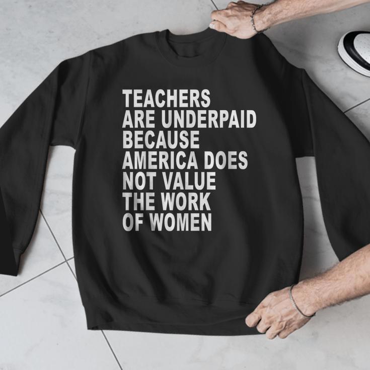 Teachers Are Underpaid Because America Does Not Value Men Women Men Graphic Sweatshirt, funny design Teachers Are Underpaid Because America Does Not Value Men Women Men Graphic Sweatshirt, funny design