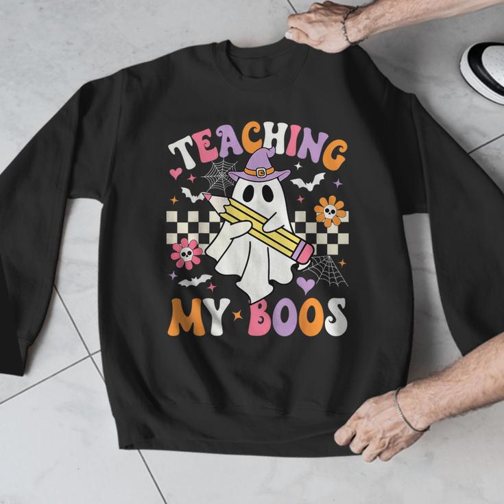 Teaching My Boos Ghost Teacher Cute Groovy Halloween Teacher Men Graphic Sweatshirt, Groovy Teacher Gifts, funny design Teaching My Boos Ghost Teacher Cute Groovy Halloween Teacher Men Graphic Sweatshirt, Groovy Teacher Gifts, funny design