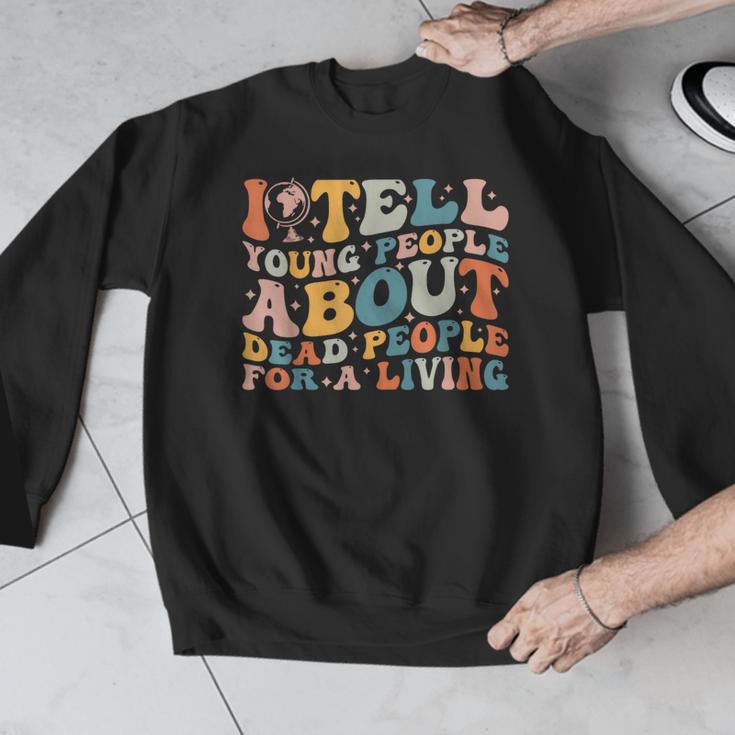 I Tell Young People About Dead People Groovy History Teacher Men Graphic Sweatshirt, History Teacher Gifts, Groovy Teacher Gifts, funny design I Tell Young People About Dead People Groovy History Teacher Men Graphic Sweatshirt, History Teacher Gifts, Groovy Teacher Gifts, funny design