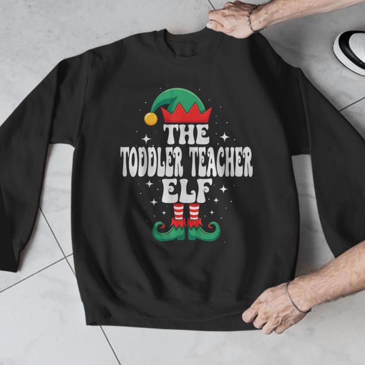 The Toddler Teacher Elf Christmas Matching Family Men Graphic Sweatshirt, funny design The Toddler Teacher Elf Christmas Matching Family Men Graphic Sweatshirt, funny design