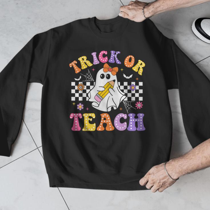 Trick Or Teach Groovy Halloween Teachers Men Graphic Sweatshirt, funny design Trick Or Teach Groovy Halloween Teachers Men Graphic Sweatshirt, funny design