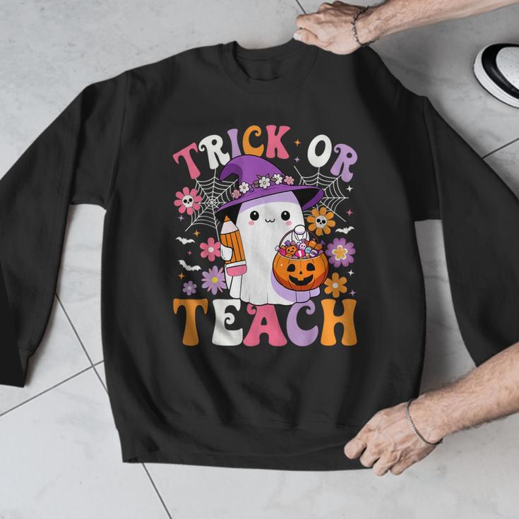Trick Or Teach Groovy Teacher Ghost Halloween Teacher Men Graphic Sweatshirt, Groovy Teacher Gifts, funny design Trick Or Teach Groovy Teacher Ghost Halloween Teacher Men Graphic Sweatshirt, Groovy Teacher Gifts, funny design