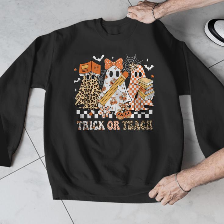 Trick Or Teach Groovy Teacher Halloween Floral Ghost Men Graphic Sweatshirt, Groovy Teacher Gifts, funny design Trick Or Teach Groovy Teacher Halloween Floral Ghost Men Graphic Sweatshirt, Groovy Teacher Gifts, funny design