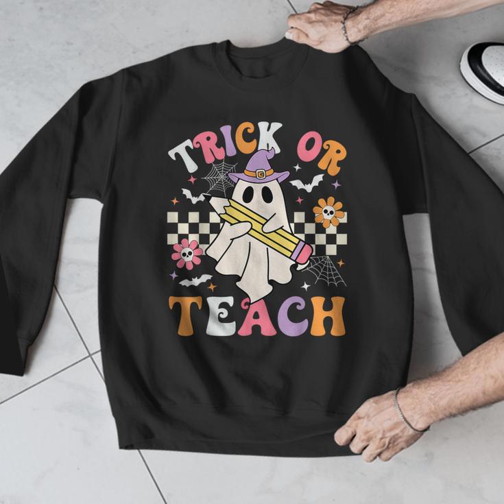 Trick Or Teach Groovy Teacher Halloween Retro Teacher Ghost Men Graphic Sweatshirt, Groovy Teacher Gifts, funny design Trick Or Teach Groovy Teacher Halloween Retro Teacher Ghost Men Graphic Sweatshirt, Groovy Teacher Gifts, funny design