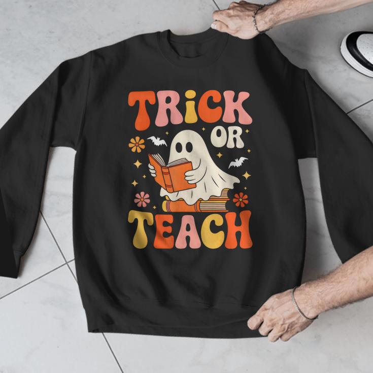Trick Or Teach Halloween Shirt For Teacher Kids Floral Ghost Men Graphic Sweatshirt, funny design Trick Or Teach Halloween Shirt For Teacher Kids Floral Ghost Men Graphic Sweatshirt, funny design