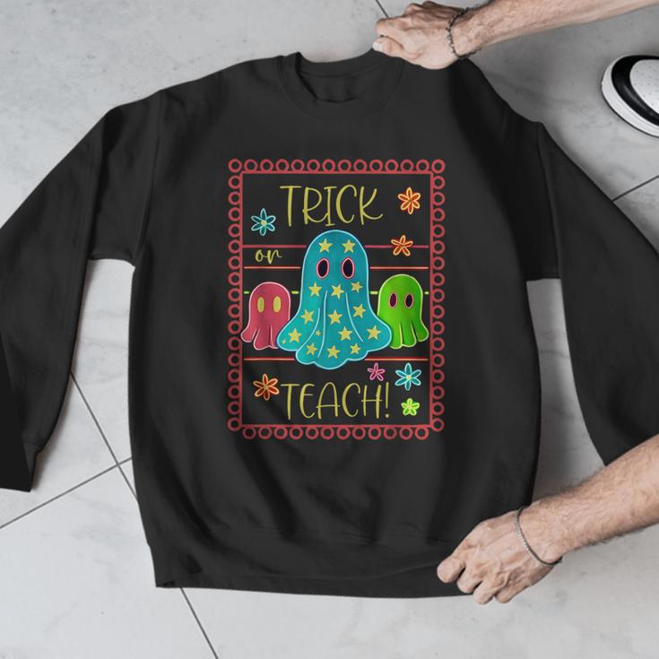 Trick Or Teach Neon Ghost Flower Teacher Spooky Halloween Men Graphic Sweatshirt, funny design Trick Or Teach Neon Ghost Flower Teacher Spooky Halloween Men Graphic Sweatshirt, funny design