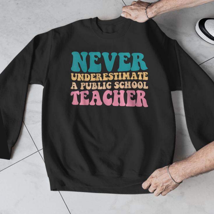 Never Underestimate A Public School Teacher Groovy Women Men Graphic Sweatshirt, Groovy Teacher Gifts, funny design Never Underestimate A Public School Teacher Groovy Women Men Graphic Sweatshirt, Groovy Teacher Gifts, funny design