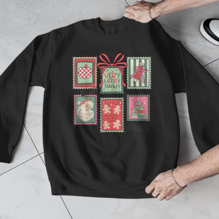 Vintage Preppy Very Merry Teacher Santa Stamps Christmas Men Graphic Sweatshirt, funny design