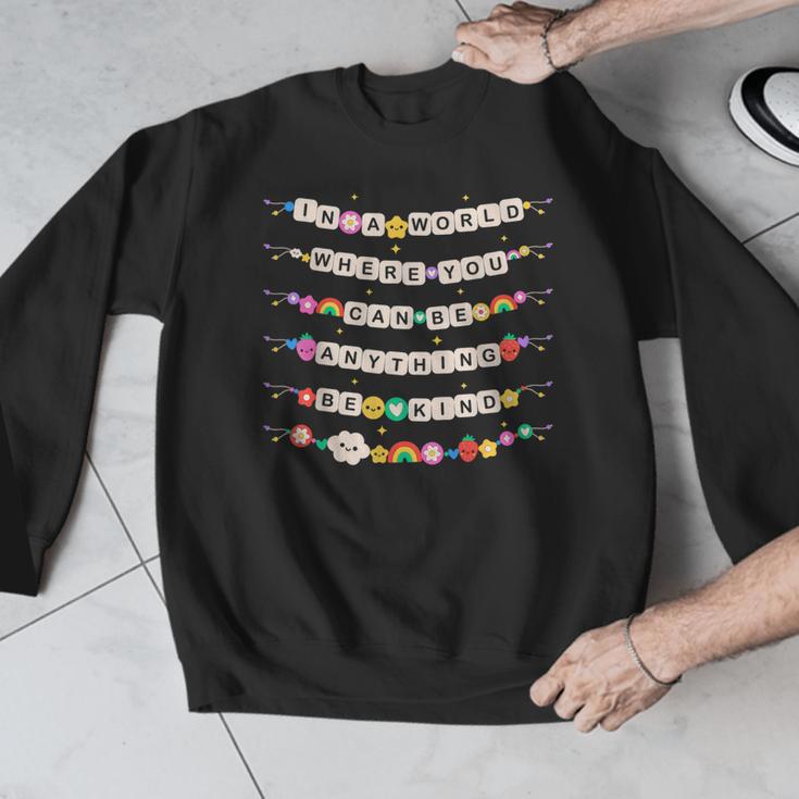 In A World Where You Can Be Anything Be Kind Girls Teachers Men Graphic Sweatshirt, funny design