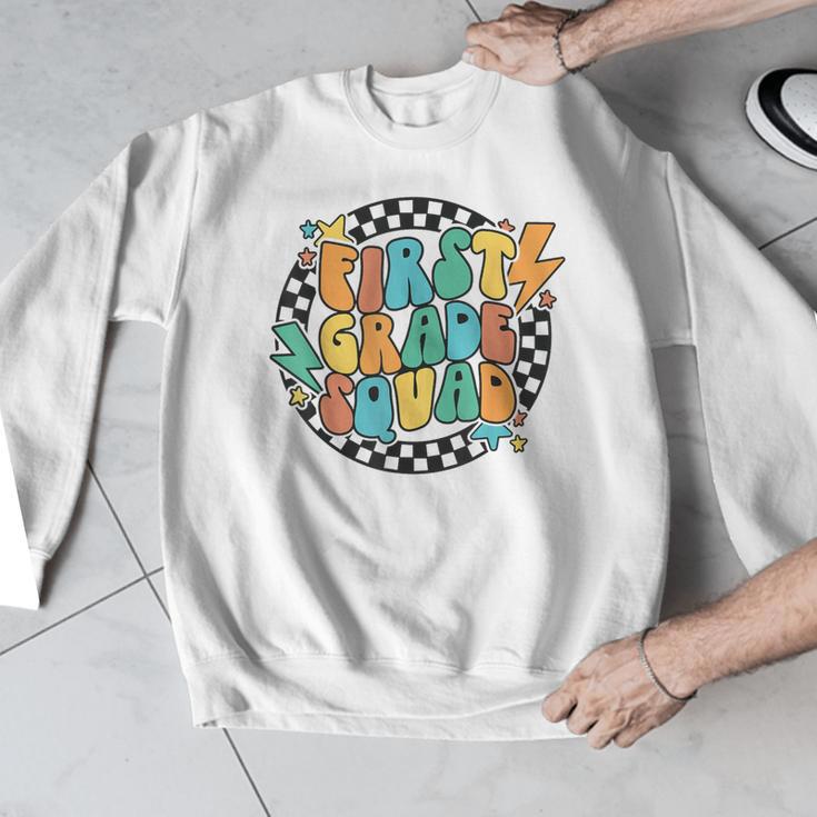 Back To School Groovy Teacher 1st First Grade Crew Squad Men Graphic Sweatshirt, Groovy Teacher Gifts, First Grade Teacher Gifts, funny design