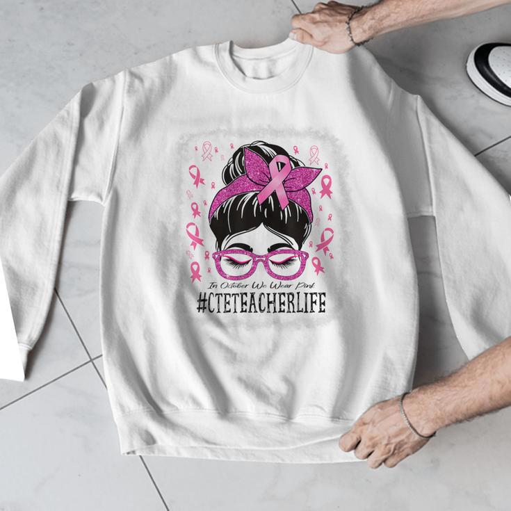 CTE Teacher In October We Wear Pink Breast Cancer Awareness Men Graphic Sweatshirt, funny design
