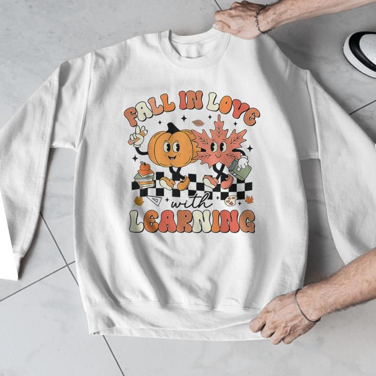 Fall In Love With Learning Teacher Retro Thanksgiving Men Graphic Sweatshirt, funny design Fall In Love With Learning Teacher Retro Thanksgiving Men Graphic Sweatshirt, funny design