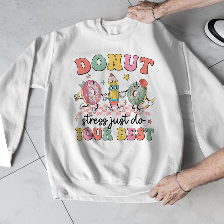 Groovy Donut Stress Just Do Your Best Testing Day Teachers Men Graphic Sweatshirt, funny design