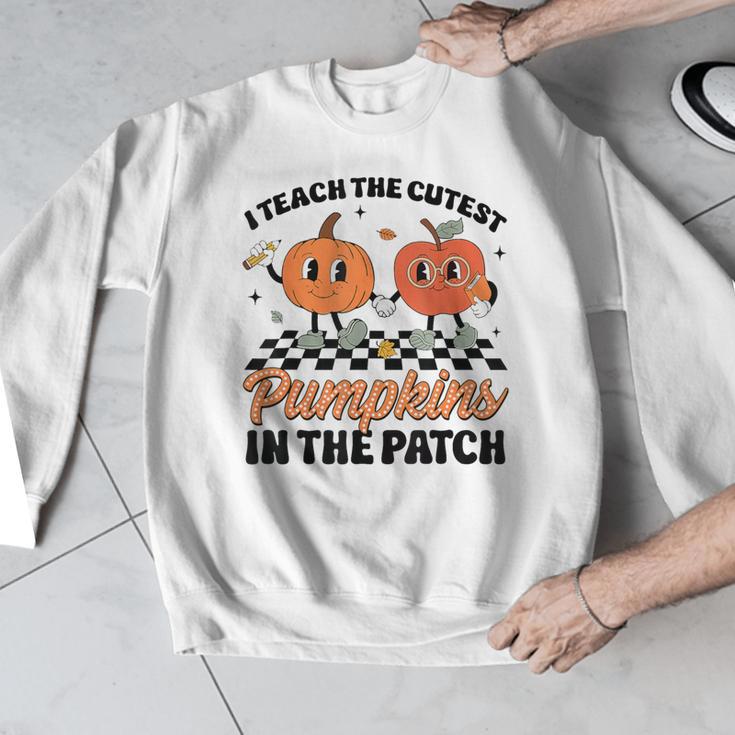Groovy I Teach The Cutest Pumpkins In The Patch For Teacher Men Graphic Sweatshirt, Groovy Teacher Gifts, funny design
