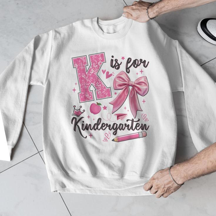 K Is For Kindergarten Teacher Coquette Bow Back To School Men Graphic Sweatshirt, funny design K Is For Kindergarten Teacher Coquette Bow Back To School Men Graphic Sweatshirt, funny design