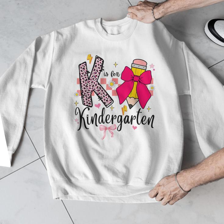 K Is For Kindergarten Teacher Coquette Bow Back To School Men Graphic Sweatshirt, funny design K Is For Kindergarten Teacher Coquette Bow Back To School Men Graphic Sweatshirt, funny design