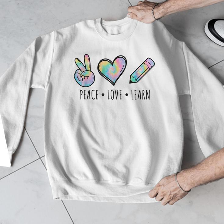 Peace Love Learn Tie Dye Teacher Kids 100th Days Of School Men Graphic Sweatshirt, funny design Peace Love Learn Tie Dye Teacher Kids 100th Days Of School Men Graphic Sweatshirt, funny design