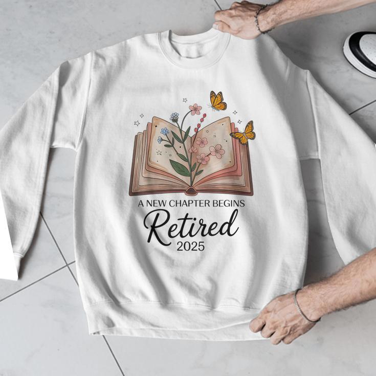 Retired 2025 A New Chapter Begins Retirement Teacher Book Men Graphic Sweatshirt, funny design Retired 2025 A New Chapter Begins Retirement Teacher Book Men Graphic Sweatshirt, funny design