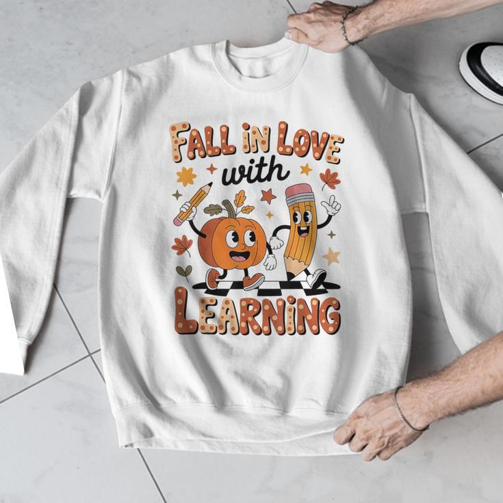 Retro Fall In Love With Learning Autumn Pumpkin Teacher Kids Men Graphic Sweatshirt, funny design