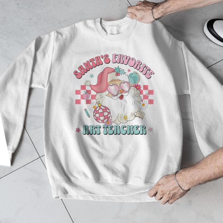 Retro Pink Christmas Santa's Favorite Art Teacher Artist Men Graphic Sweatshirt, funny design Retro Pink Christmas Santa's Favorite Art Teacher Artist Men Graphic Sweatshirt, funny design