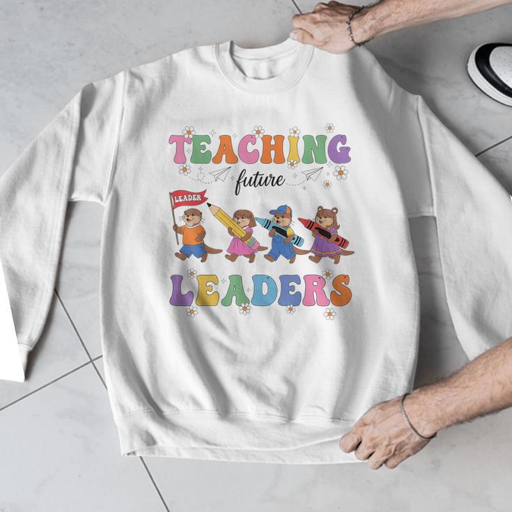 Teaching Future Leaders Otter Back To School Teacher Men Graphic Sweatshirt, Future Teacher Gifts, funny design Teaching Future Leaders Otter Back To School Teacher Men Graphic Sweatshirt, Future Teacher Gifts, funny design