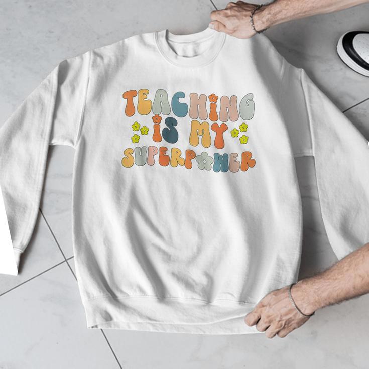 Teaching Is My Superpower Vintage Groovy University Teacher Men Graphic Sweatshirt, Groovy Teacher Gifts, funny design Teaching Is My Superpower Vintage Groovy University Teacher Men Graphic Sweatshirt, Groovy Teacher Gifts, funny design